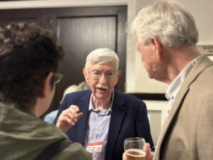 International Club of Annapolis member socializing with guests during a dinner event at the DoubleTree Hotel in Annapolis, Maryland